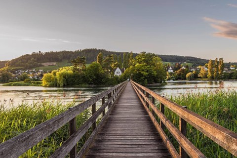 Wooden bridge over the Rhine to the Werd monastery island near Stein am Rhein, Eschenz, Canton