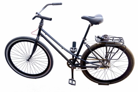 Black retro style bicycle isolated on white background with copy space