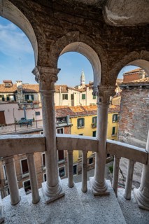 View of houses in Venice from the spiral staircase of Palazzo Contarini del Bovolo, palace with