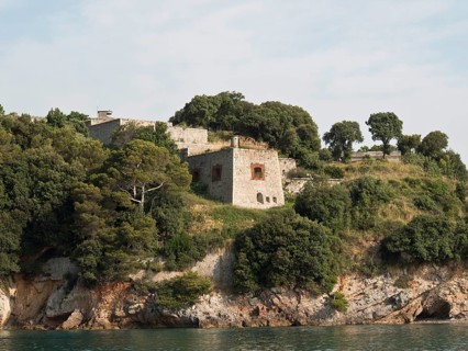 Ruins of a historic building on a wooded cliff overlooking the sea, Bari, Italy, Europe