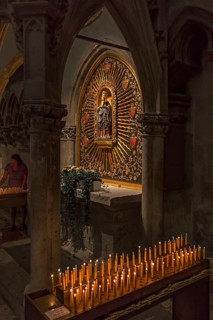 Madonna in a halo in the Sailer Chapel, sacrificial candles in front, St Peter's Cathedral,