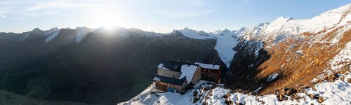Mountain panorama and glacier, mountain hut Ramolhaus in autumn with snow, view of Gurgler Ferner
