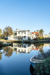 Houses along Venice Canal, Los Angeles, California. Vertical shot
