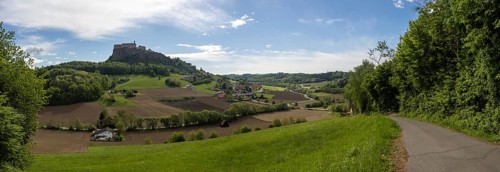 Field path at the edge of the forest, meadows, fields, arable land, Riegersburg Castle in the
