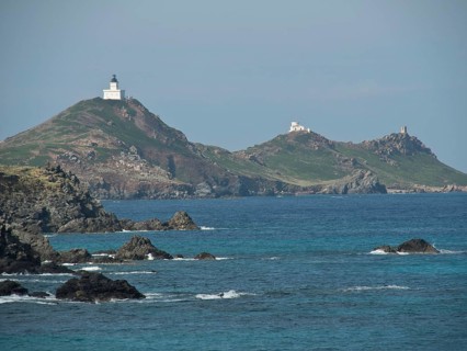 Coastal landscape with two islands and lighthouses, surrounded by rocks and sea, Corsica, Ajaccio,