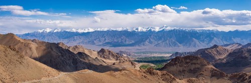 Panorama from the Khardong Pass, the second highest motorway pass in the world, over Leh and the