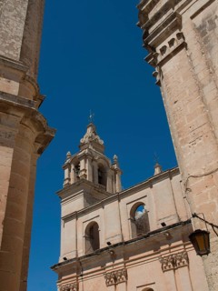 Close-up of bell towers of a baroque building under a clear sky, Historic buildings with beautiful