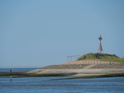 Dune landscape with metal structure and sea in the background, Baltrum Germany