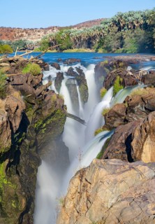 Epupa Falls waterfall on the Kunene River backlit, long exposure, Kunene, Namibia, Africa