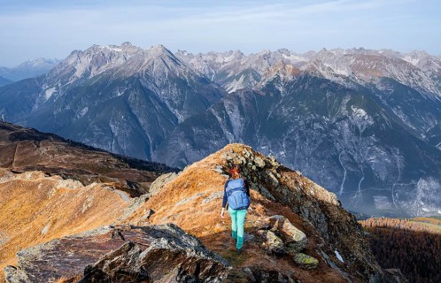 Mountaineer in the mountains in autumn, Venet crossing, Oetztal Alps, Tyrol, Austria, Europe
