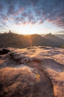 View of Trifels Castle, from Engels Landing rock, with the young tower in autumn at sunset.