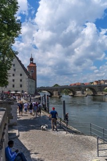 Danube promenade, behind the bridge tower museum with the Stone Bridge, Regensburg, Upper
