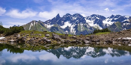 Lake Gugger See, behind it the central main ridge of the Allgaeu Alps, Allgaeu, Bavaria, Germany,
