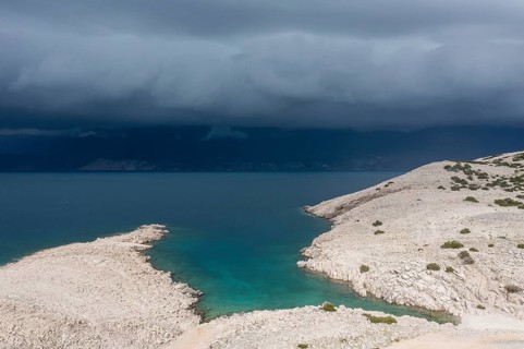 Stormy atmosphere and dark clouds on the coast, island of Pag, Zadar, Dalmatia, Croatia, Europe