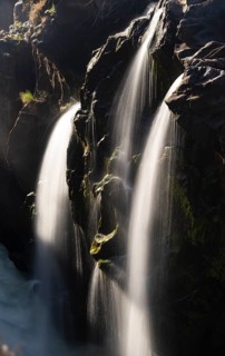 Epupa Falls waterfall on the Kunene River backlit, long exposure, Kunene, Namibia, Africa