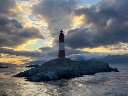 Lighthouse Faro Les Eclaireurs at sunset, dramatic clouds, Beagle Channel, Tierra del Fuego, Tierra