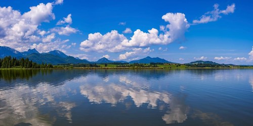 Lake Hopfensee, near Fuessen, Ostallgaeu, Allgaeu, with the Allgaeu Alps behind it, Bavaria,