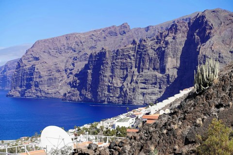Los Gigantes cliffs, Canary Islands, Spain, Europe, Steep cliffs towering over the blue sea, with