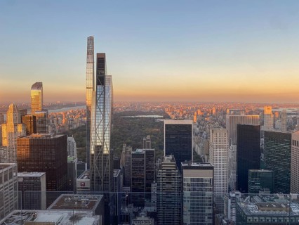 City view with skyscrapers and a sunset in the background, the skyline of new york with impressive