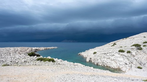 Stormy atmosphere and dark clouds on the coast, island of Pag, Zadar, Dalmatia, Croatia, Europe