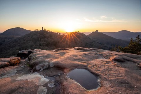 View of Trifels Castle, from Engels Landing rock, with the young tower in autumn at sunset.