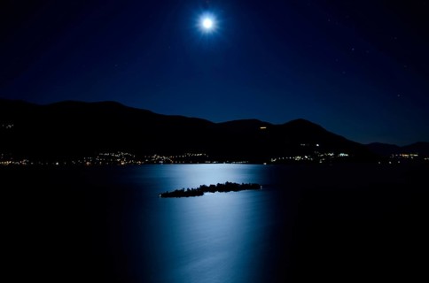 Aerial View with Moon Light Reflected over an Alpine Lake Maggiore with Brissago Islands and
