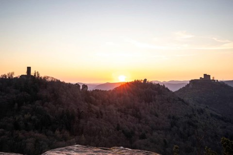 View of Trifels Castle, from Engels Landing rock, with the young tower in autumn at sunset.