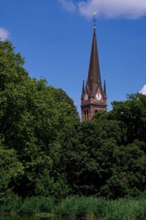 View from Johannapark to Heilig-Kreuz-Kirche, church tower, Leipzig, Saxony, Germany, Europe
