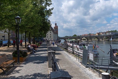 Danube promenade, behind the bridge tower museum with the Stone Bridge, Regensburg, Upper