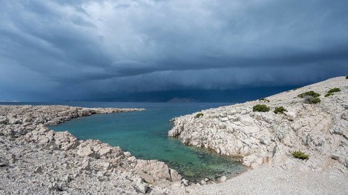 Stormy atmosphere and dark clouds on the coast, island of Pag, Zadar, Dalmatia, Croatia, Europe
