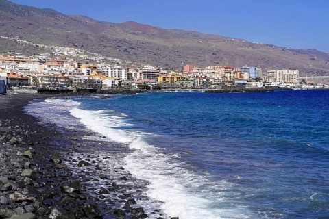 Black volcanic beach in Candelaria, Tenerife, Canary Islands, Spain, Europe, coastal town on a