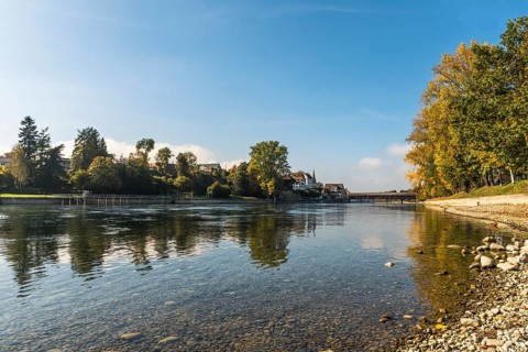 View from the banks of the Rhine near Gailingen to Diessenhofen with the historic wooden bridge,