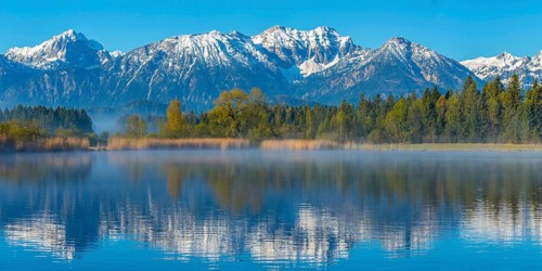 Morning atmosphere at the Hopfensee, near Fuessen, Ostallgaeu, Allgaeu, behind the Allgaeu Alps,