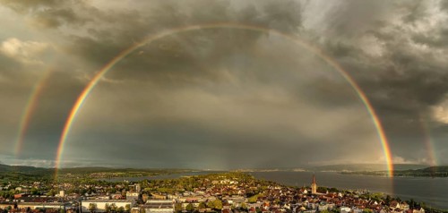Aerial view, panorama of the city of Radolfzell on Lake Constance in the evening with a double