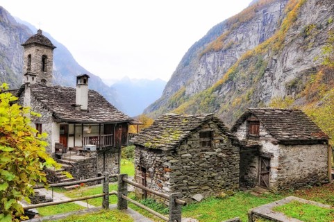 Beautiful Rustic House and Church in Mountain Valley in Autumn in Val Bavona, Ticino, Switzerland,