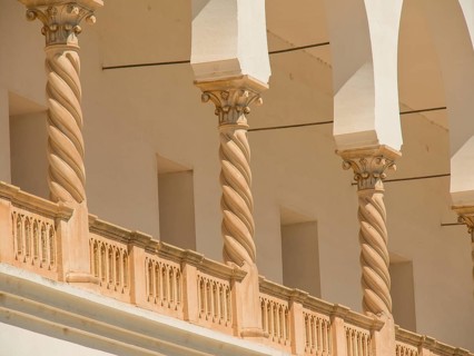 Close-up of architectural columns with ornate details in a light-coloured building, Tunis in Africa