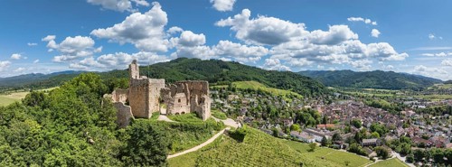Aerial view, panorama of Staufen Castle, on a vineyard, Schlossberg, Staufen im Breisgau,
