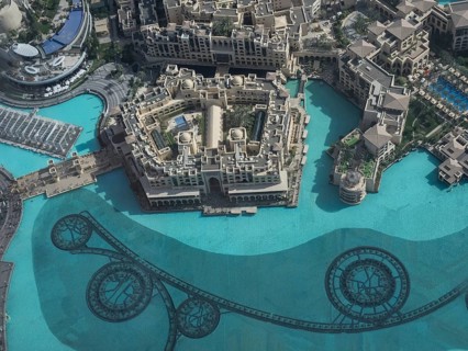 A luxurious hotel resort with large swimming pools and modern buildings, dubai, arab emirates