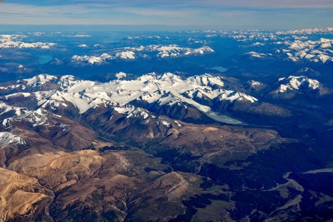 Aerial view of the snow-covered Patagonian Andes with the heavily glaciated Sierra La Sangra