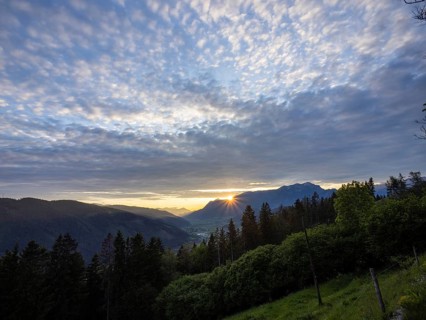 Sunset over the Eisenerz Alps, mountain massif Reiting, in the Liesingtal the village Traboch, view