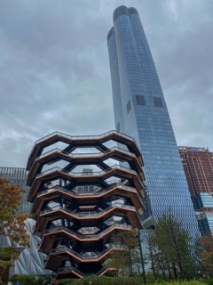 Modern architectural building under a cloudy sky as part of the urban landscape, the skyline of new
