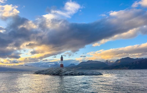 Lighthouse Faro Les Eclaireurs at sunset, dramatic clouds, Beagle Channel, Tierra del Fuego, Tierra