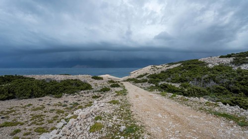 Stormy atmosphere and dark clouds on the coast, island of Pag, Zadar, Dalmatia, Croatia, Europe