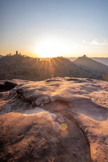 View of Trifels Castle, from Engels Landing rock, with the young tower in autumn at sunset.