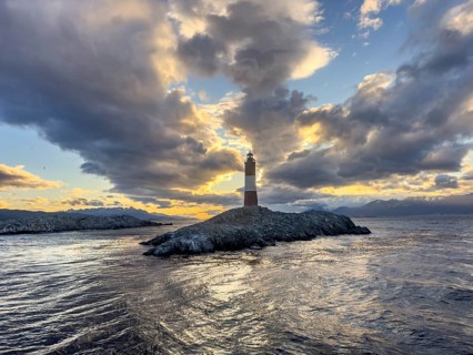 Lighthouse Faro Les Eclaireurs at sunset, dramatic clouds, Beagle Channel, Tierra del Fuego, Tierra