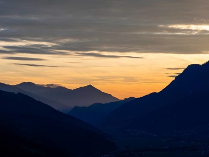 Sunset over the Eisenerz Alps, mountain massif Reiting, in the Liesingtal the village Traboch, view