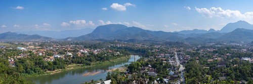 Panorama over Luang Prabang with Nam Khan River and Wat Phol Pao in the background, Laos, Asia