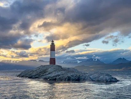 Lighthouse Faro Les Eclaireurs at sunset, dramatic clouds, Beagle Channel, Tierra del Fuego, Tierra