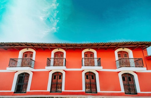 Colorful colonial house with 4 balconies. Granada, Nicaragua. Architecture of colorful houses of