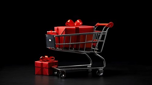 Black friday shopping cart brimming with black gift boxes tied with red ribbons against a dark grey